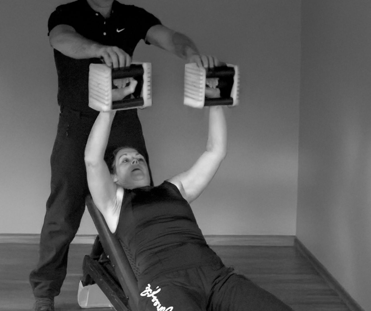 Strength & Conditioning Coach Bedford, woman lifting weights bedford